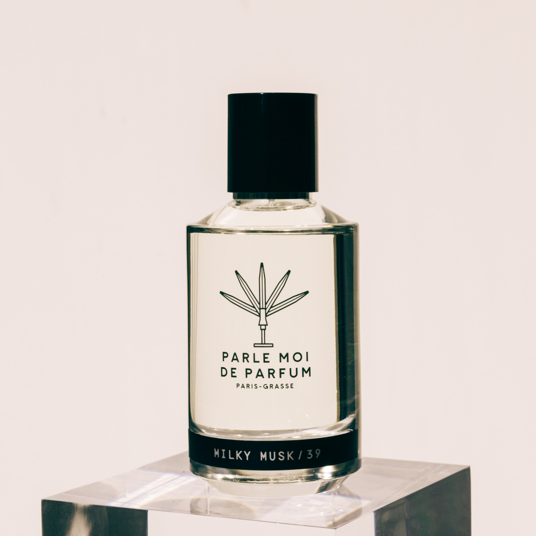 Milky Musk / 39 Original Bottle on background